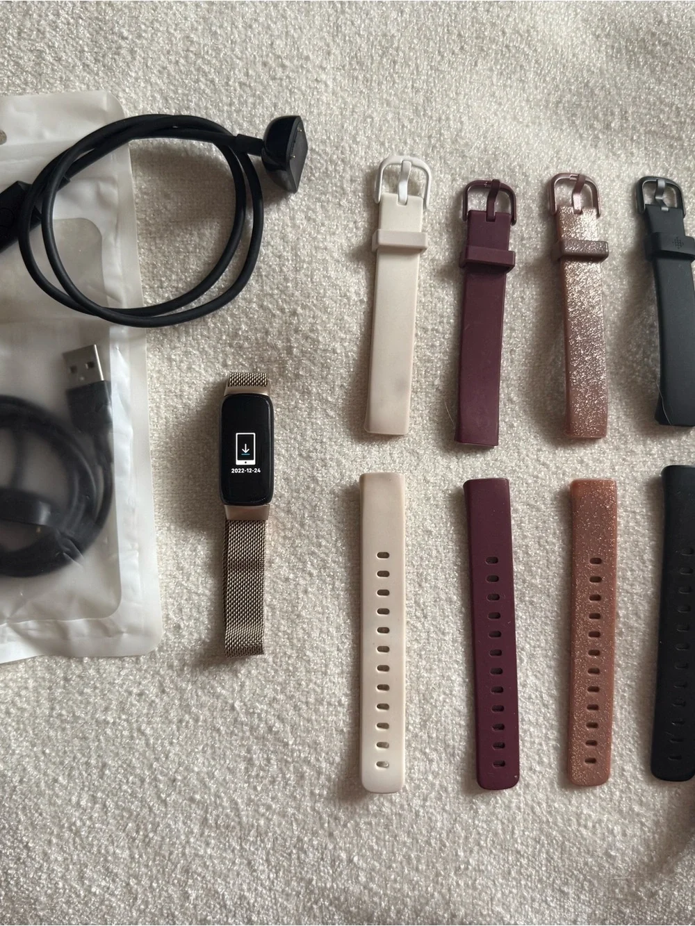 Fitbit Luxe watch (used for 3 months) with extra accessories